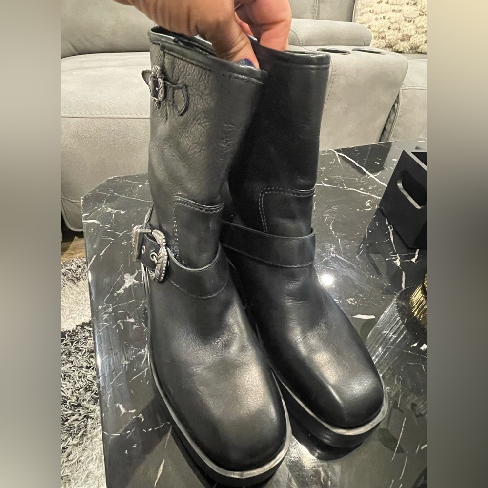 Larroude Hardy Boots with Silver Buckle Accents.
